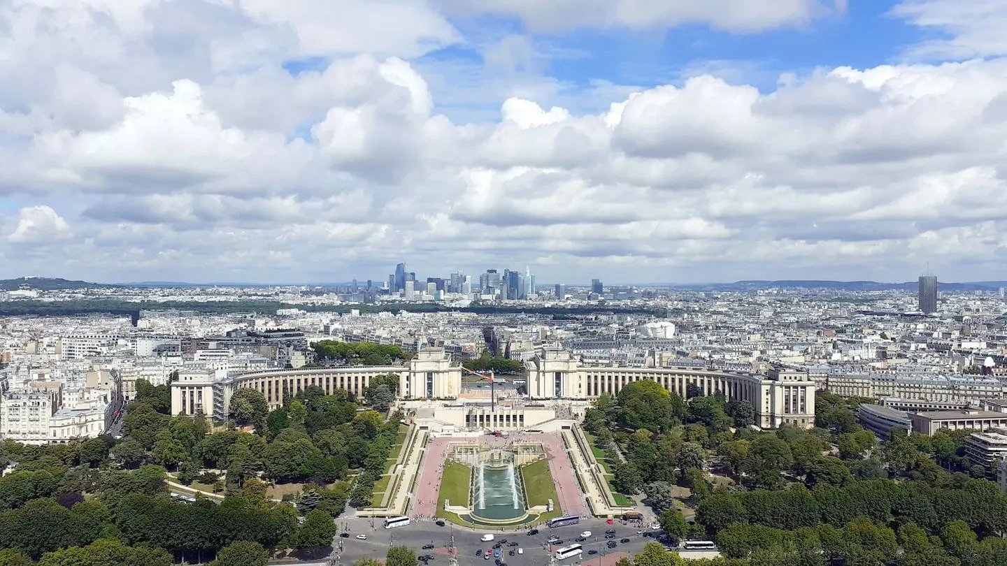 Paris seen from the Eiffel Tower, with the Trocadéro gardens in the foreground and La Défense on the horizon