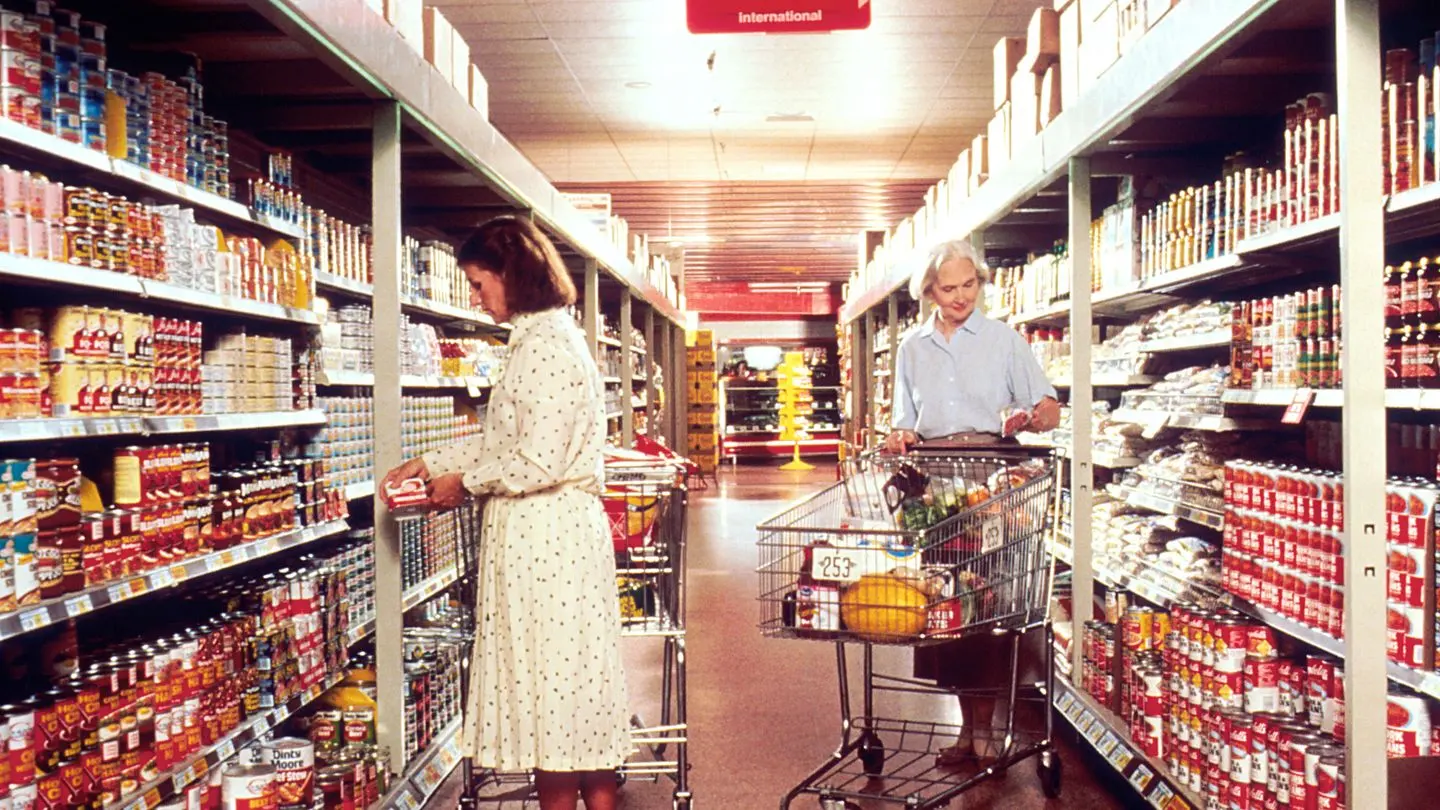 Shoppers choosing groceries in a supermarket
