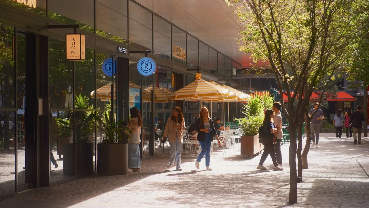 People in front of the shopping mall.